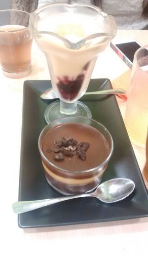 postres del diá: mousse de maracuja y chocolate mousse at Yerbabuena - Bordadores in Madrid