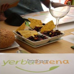 This was the free starter that every table got once they arrived. It was an amazing cold wild rice salsa with one nacho chip. Delicious! at Yerbabuena - Bordadores in Madrid