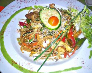 Oriental-style noodles with seitan, tofu, vegetables and vegetables  at Yerbabuena - Bordadores in Madrid
