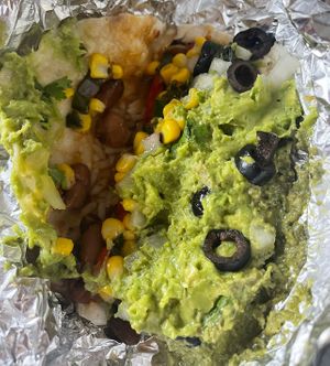 Taco with beans, pesto, olives, guacamole, corn salsa, ricee  at Illegal Pete's in Greenwood Village