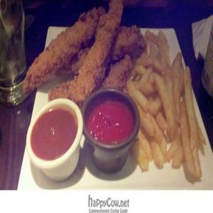 Sorry for the quality of this picture, but it was dark in there - the fries were amazing! at Vegetarian's Paradise 2 in New York City