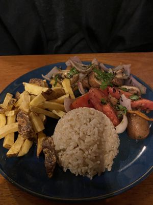 Super tasty lomo saltado w mushrooms...savory and the best vegan saltado so far... at Siembra in Lima