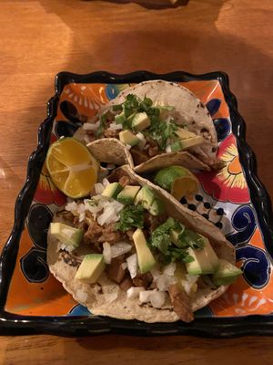 Tacos al pastor, complete w that chargrilled street flavor ...delicious! at Siembra in Lima