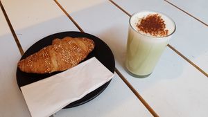 Vegan croissant and matcha latte at Lost Weekend in Munich