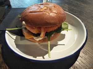 Dry tasteless chick'n burger. at Lost Weekend in Munich