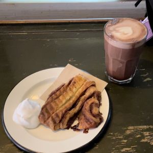 Hot chocolate and cinnamon roll  at Lost Weekend in Munich