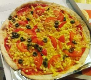 one pizza with vegan cheese from delivery at Pizza Caesar in Bratislava