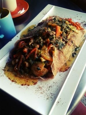great salty pancake full of veggies and hummus at Namaste Restaurant in Guatape