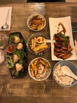 Left: fried xiaolongbao with smoked tofu, carrot, and zucchini filling; middle: mung bean starch noodles in spicy vinegar sauce; right: smoked tofu, rice. at Tianfuzius in Berlin