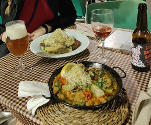 Vegan paella and breaded heura with mushroom sauce at Vegetalia - Gotico in Barcelona