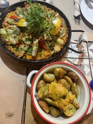 Heura vegan chikn paella and Patatas bravas   at Vegetalia - Gotico in Barcelona