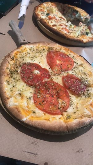 Pizza with pesto, vegan cheese and tomato😍 at Vegetalia - Gotico in Barcelona