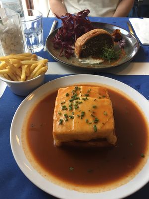 Francesinha, fries and lentil Wellington at Lupin Restaurante Vegetariano in Porto
