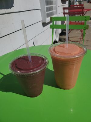Small Smurf smoothie and medium Big Island smoothie.  at Vela Juice Bar in Plymouth