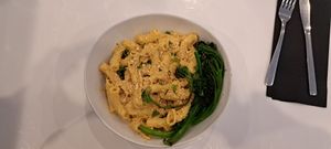 Cashew cheddar mac with GF noodles and broccolini (add-on). Delicious! at Naked Cafe in Kelowna