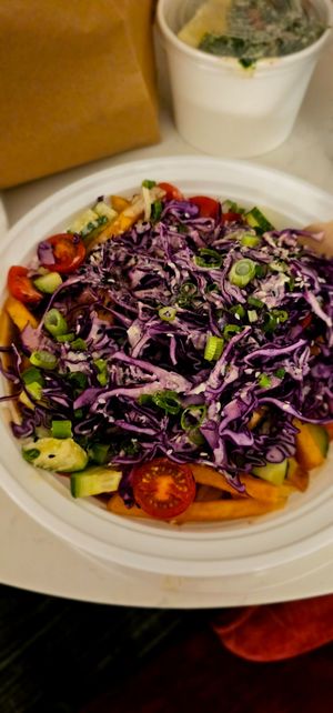 Simply the best restaurant in Kelowna. Market poutine 😋. at Naked Cafe in Kelowna