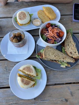 Breakfast sandwiches, BLTA with garden salad, sweet chilli seitan bites  at Naked Cafe in Kelowna