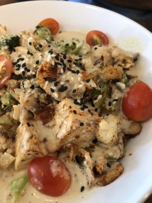 Buddha bowl. Soft tofu with a creamy sauce over turmeric quinoa at Naked Cafe in Kelowna