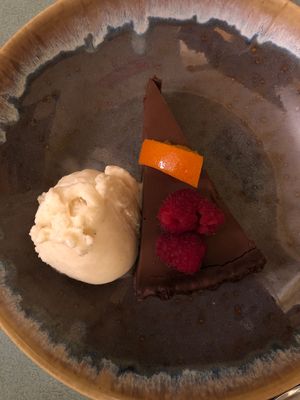 Chocolate tart w poached clementine and vegan ice cream   at The Waiting Room in Stockton-on-tees