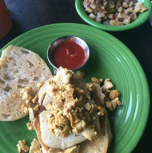 Breakfast sandwich and rosemary potatoes! at Allie's Vegan Pizzeria and Cafe in Spokane
