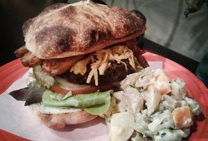 Bacon cheese burger with house made pattie, tempeh bacon, and cheddar  at Allie's Vegan Pizzeria and Cafe in Spokane