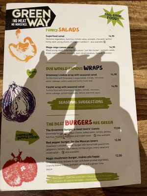 The menu (with my nails’ shadow 😄)  at Greenway in Antwerpen