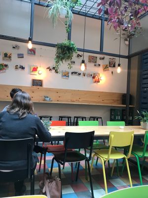 backroom with the wall decorated with photos and drawings of vegetables  at Greenway in Antwerpen
