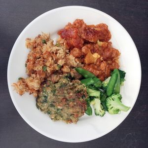 Daily Special: Veggie patty, broccoli and snow pea stir-fry, sticky rice, cauliflower sweet and sour at Restaurante Delicia in San Jose