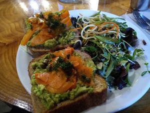 Avocado toast with carrot lox, dill and capers at Indigo Age Cafe in Vancouver