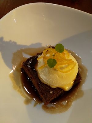 Dessert: sticky caramel cake, ice cream and sugarcoated orange at Hortus in The Hague
