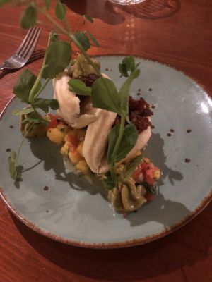 Pulled bbq celeriac, miniature bao buns, avocado puree, mango and lime salsa at Hortus in The Hague