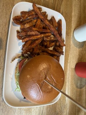 Philly Cheessteak Burger with Sweet potato fries  at The Vegan Bar in Malmo