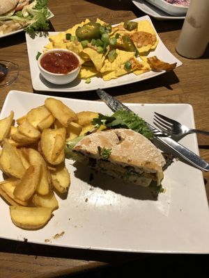 Nachos and the mushy mushy with the chickpea patty  at The Vegan Bar in Malmo