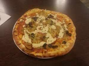 vegan pizza with seitan and two styles of vegan cheese and sauce. All replacements are organic. at Grenz-Kebap in Lindau