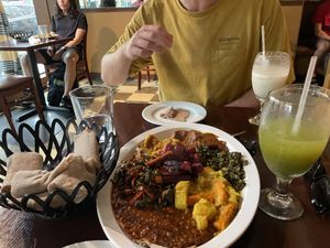 Mint lemonade and veggie platter with injera.   at Hawi Ethiopian Restaurant in Ithaca