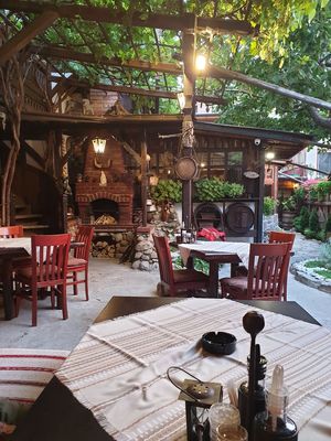 Outside seating area at Matsurev Inn in Bansko