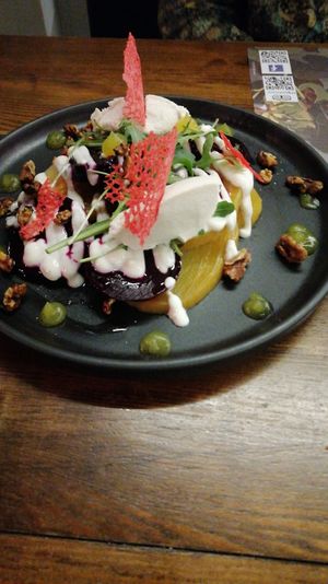 Red and yellow beetroot salad with vegan cream at roots in Thessaloniki