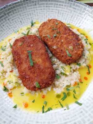 vegan schnitzel with cauliflower risotto at roots in Thessaloniki