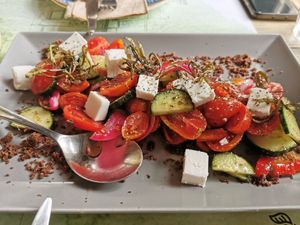 Greek salad with vegan feta and olive dust at roots in Thessaloniki