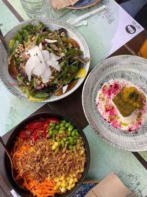 Green salad, Buddha bowl and stuffed wine leaves   at roots in Thessaloniki