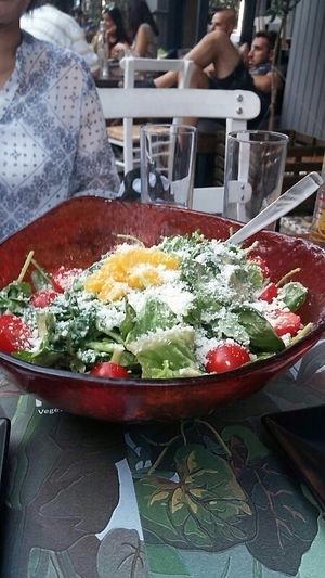 Green salad with vegan mozzarella.  at roots in Thessaloniki