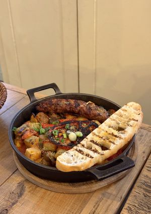 Slow roasted vegetables with sausage  at roots in Thessaloniki