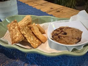 Tempeh tofu with sauce  at Wulan Vegetarian Warung in Ubud
