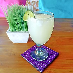 Ginger Lemon Soda with Ice. Made with grated ginger, fresh squeezed Indonesian lemons and fresh soda. Cleans the pallette and make all food taste better.  at Wulan Vegetarian Warung in Ubud