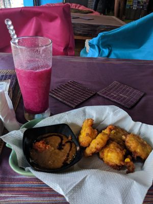 Corn fritters and dragonfruit smoothie at Wulan Vegetarian Warung in Ubud