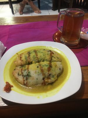 Savoury veg stuffed pancakes and lemon ginger tea  at Wulan Vegetarian Warung in Ubud