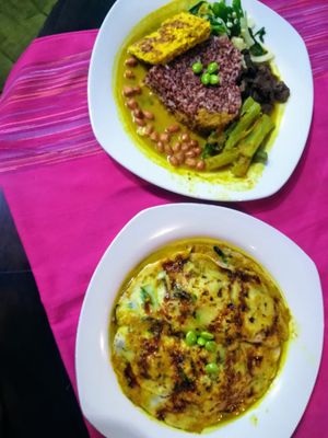 Delicious savoury pancake and tempeh curry. Both amazing, but a pancake is a winner. at Wulan Vegetarian Warung in Ubud