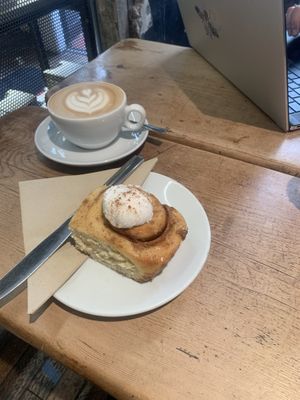 oat latte and cinnamon bun  at Brew Lab in Edinburgh