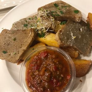 seitan cutlets with salsa and steak fries - tasty but not omg tasty at Napfenyes Bistro in Budapest