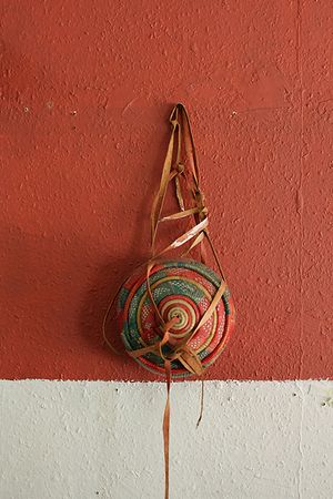 Interior ornament inside Andu Cafe - Agelgil (Traditional goat skin lunch box) at Andu Caffe in East London